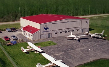 The Advantages of Building an Aircraft Hangar vs. Renting